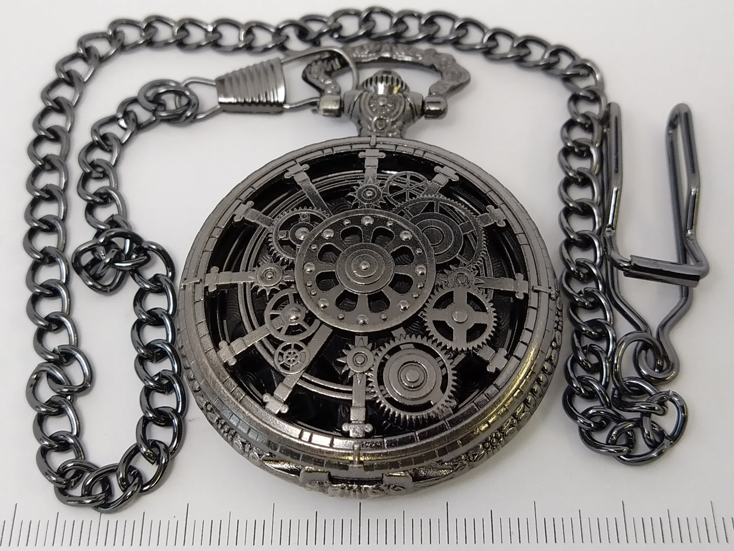 Clockwork Medallion, with mini metal dice