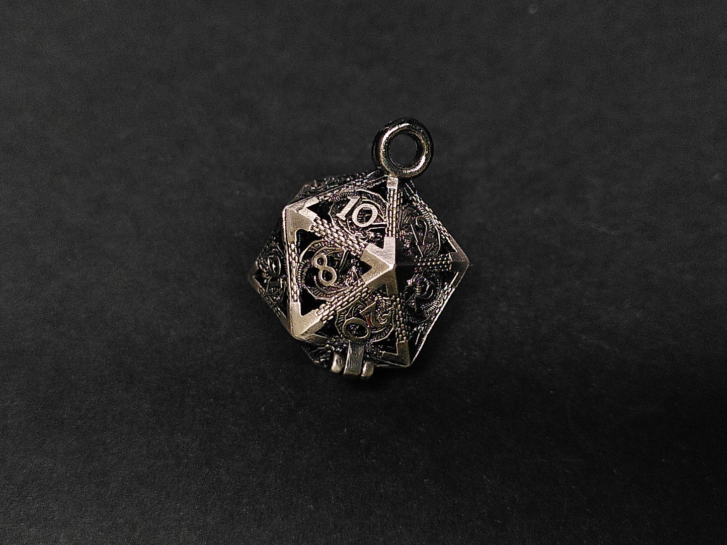 Silver Hollow Dragon dice cage pendant, with mini metal dice