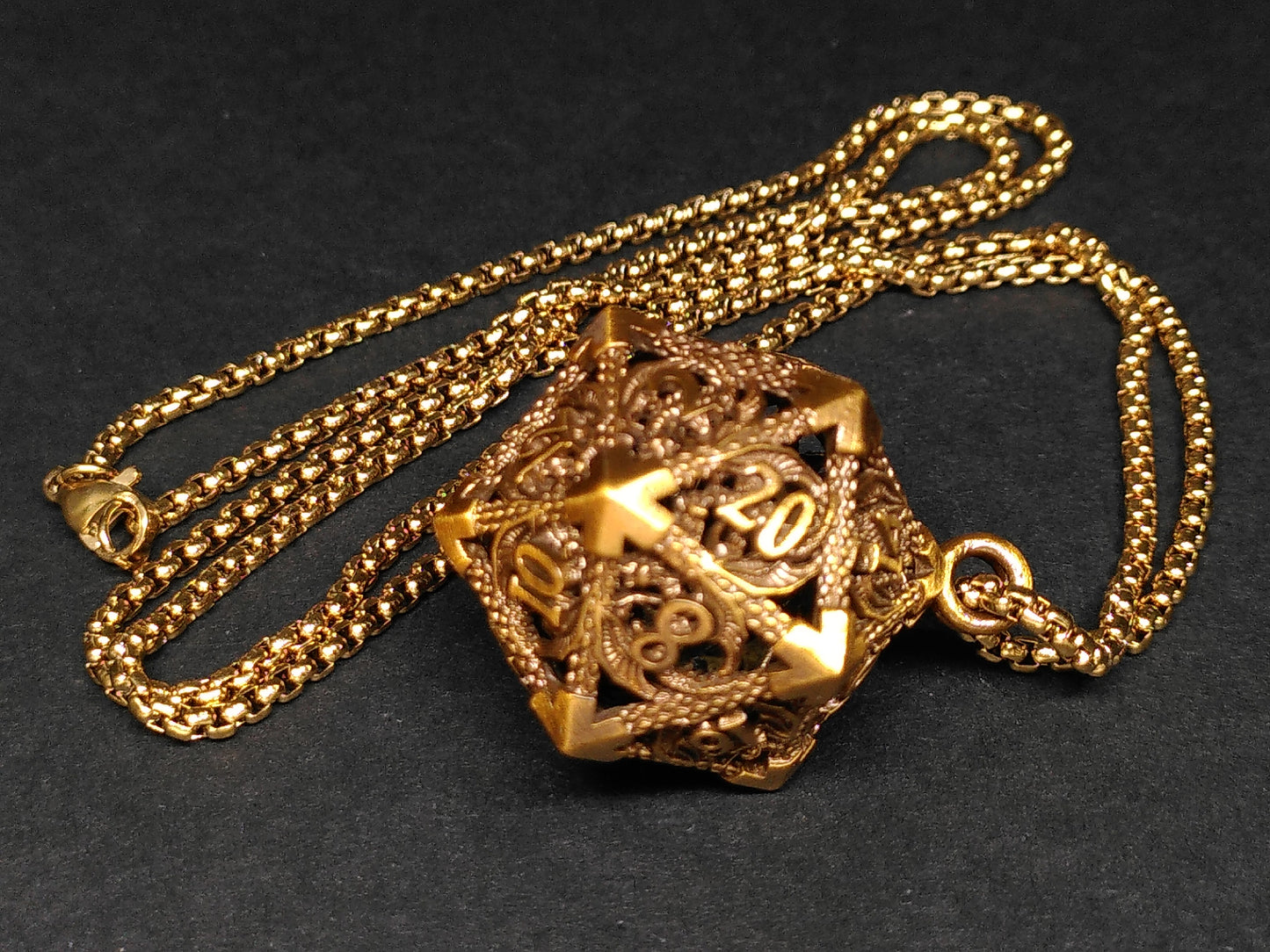 Gold Hollow Dragon dice cage pendant, with mini metal dice