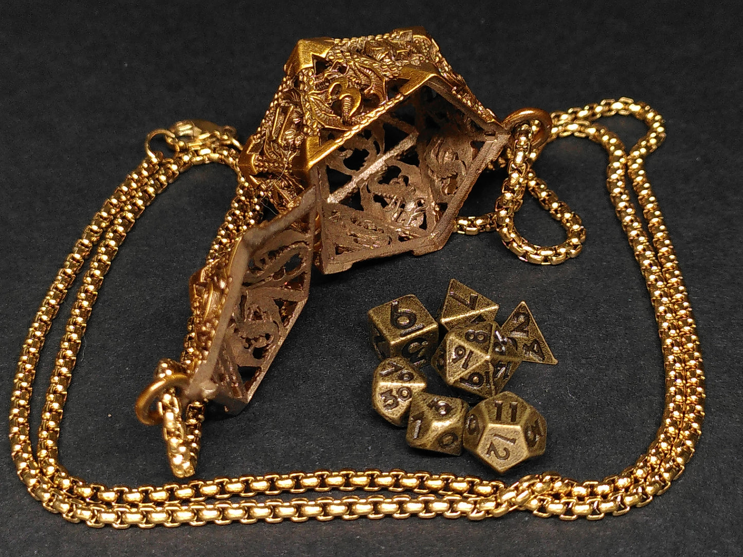 Gold Hollow Dragon dice cage pendant, with mini metal dice
