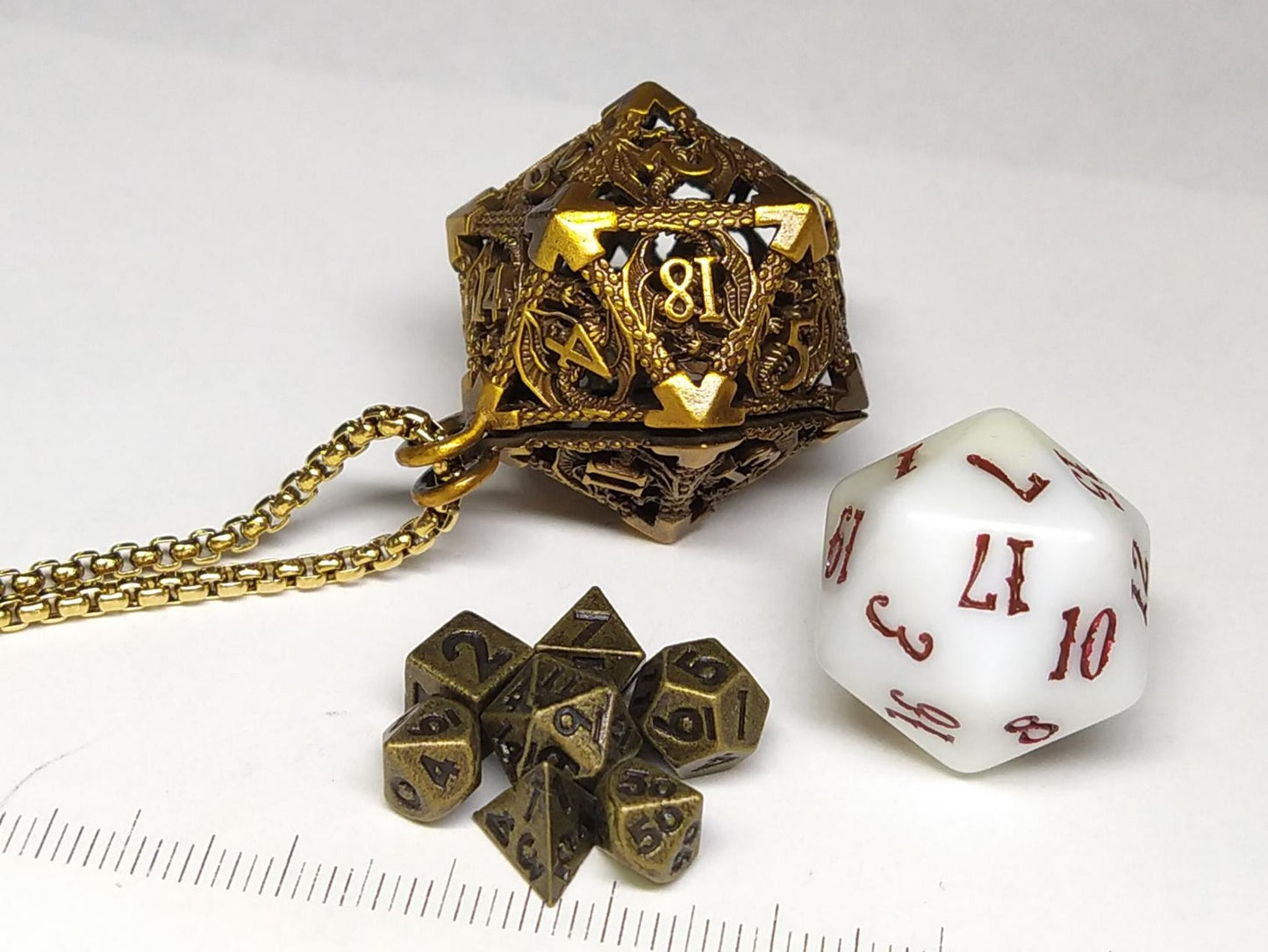 Gold Hollow Dragon dice cage pendant, with mini metal dice