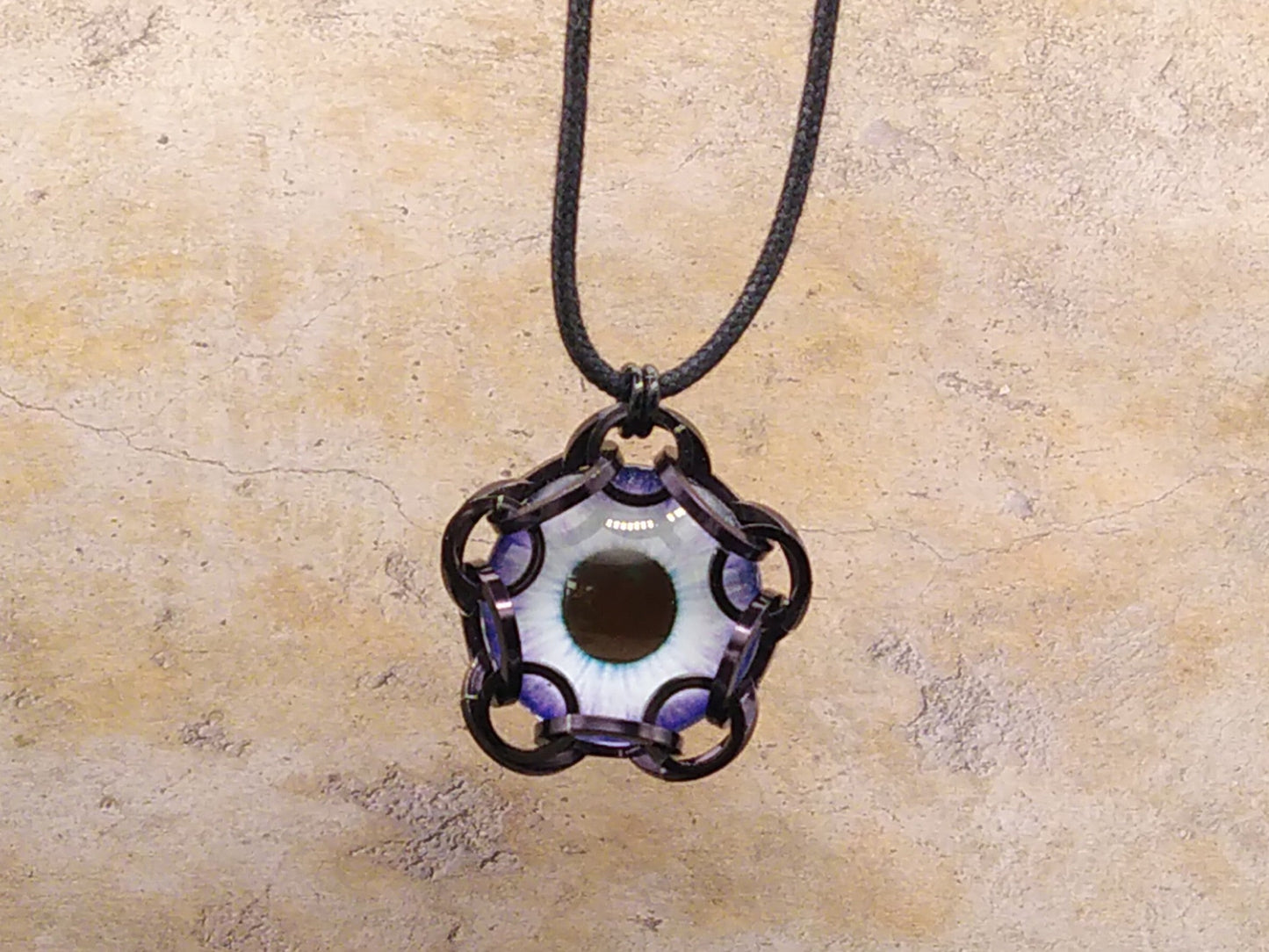 Eye pendant halskettingen
