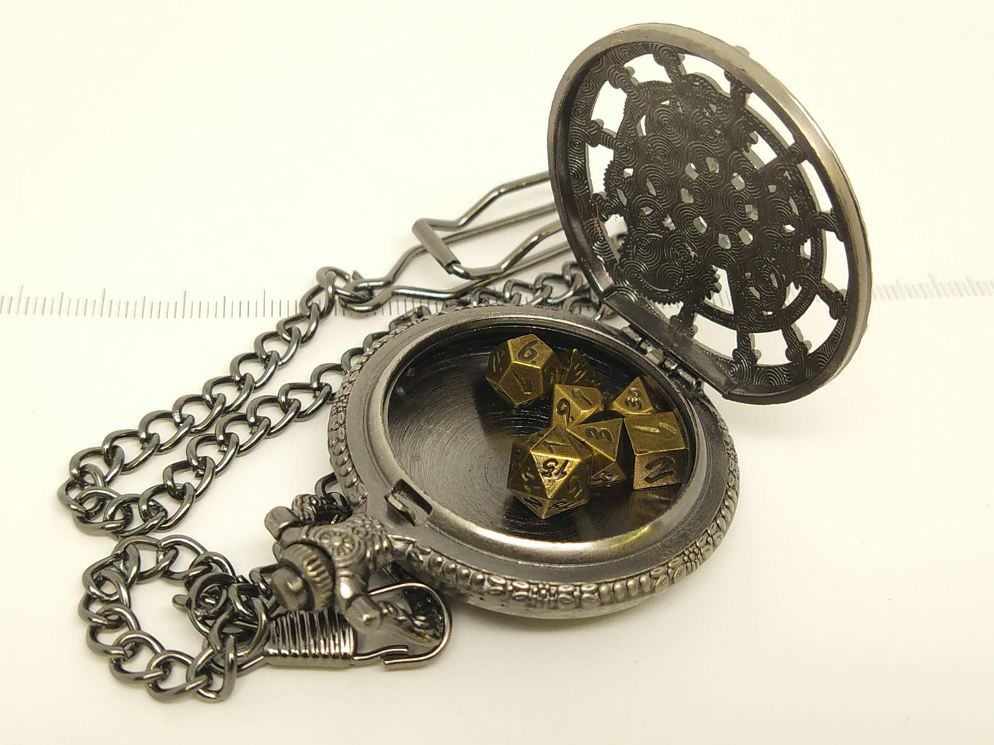 Clockwork Medallion, with mini metal dice