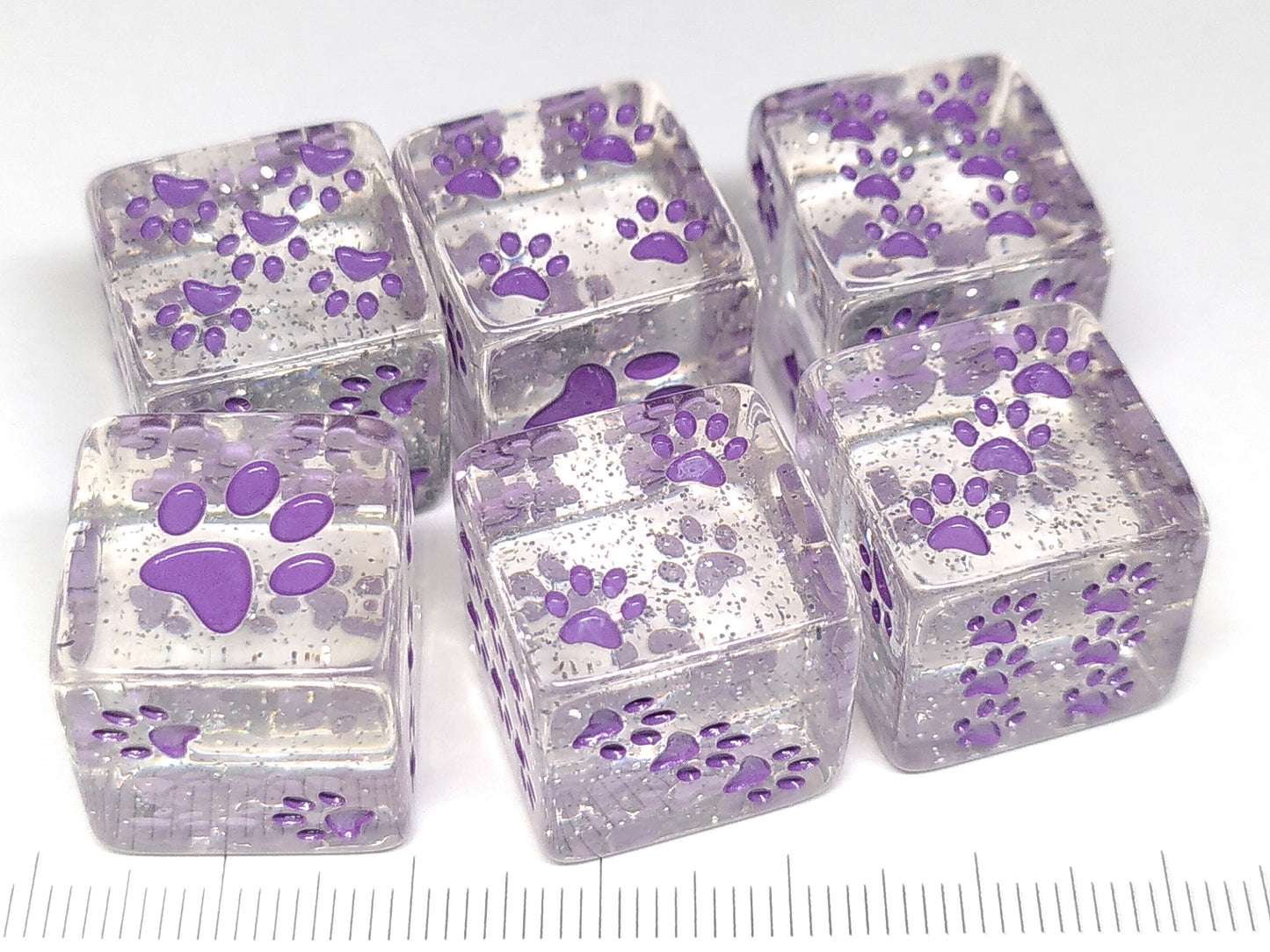 Set of 6 6-sided, 16mm transparent glitter with purple cat paws