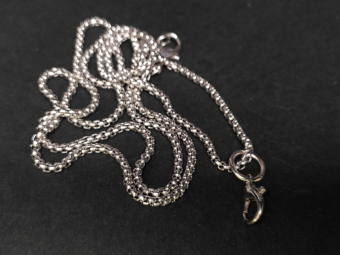 Silver Hollow Dragon dice cage pendant, with mini metal dice