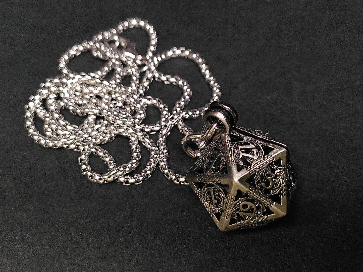 Silver Hollow Dragon dice cage pendant, with mini metal dice
