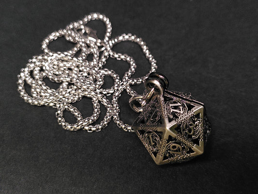Silver Hollow Dragon dice cage pendant, with mini metal dice
