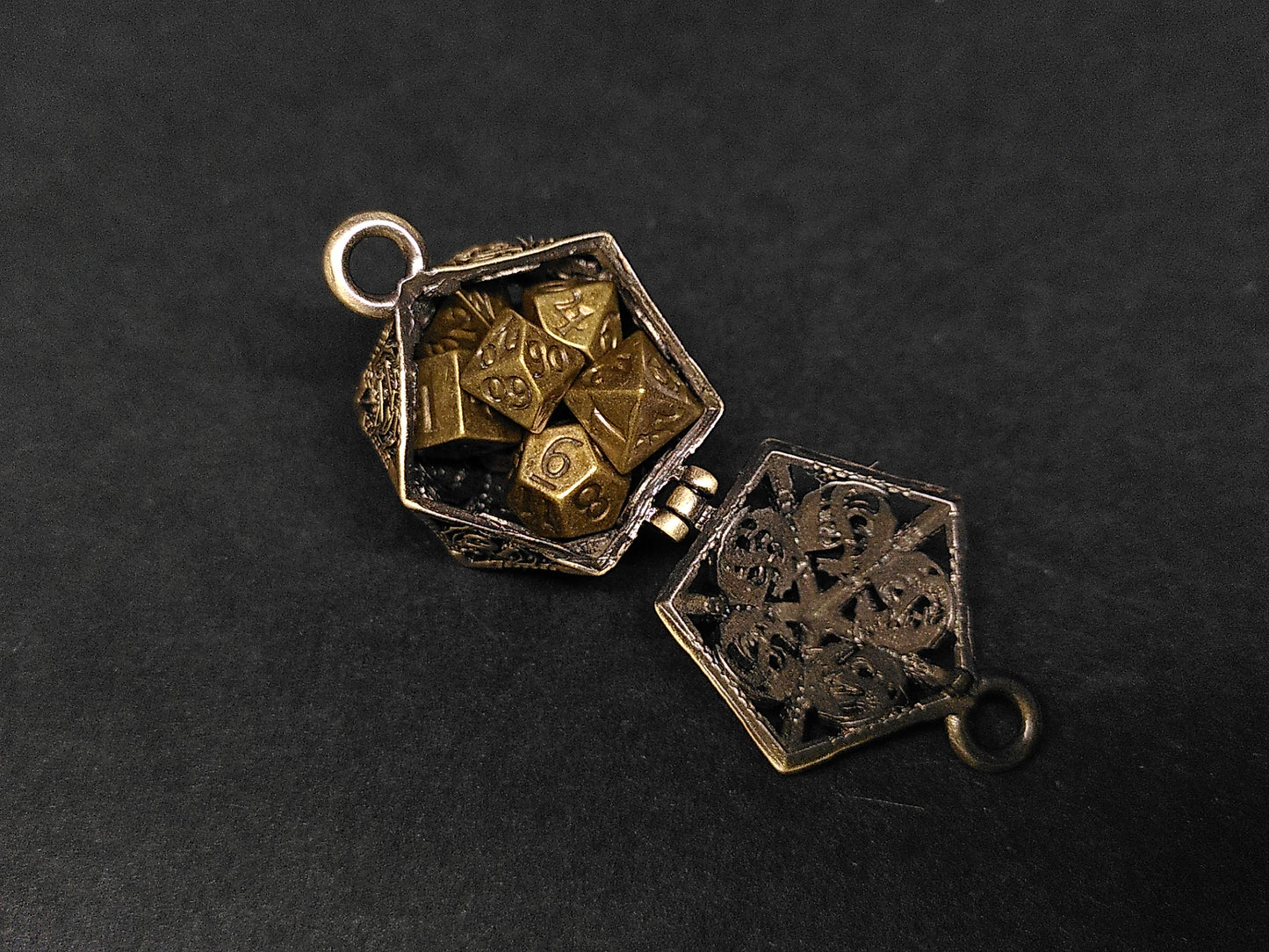 Gold Hollow Dragon dice cage pendant, with mini metal dice