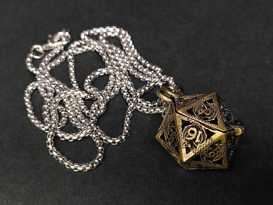 Gold Hollow Dragon dice cage pendant, with mini metal dice
