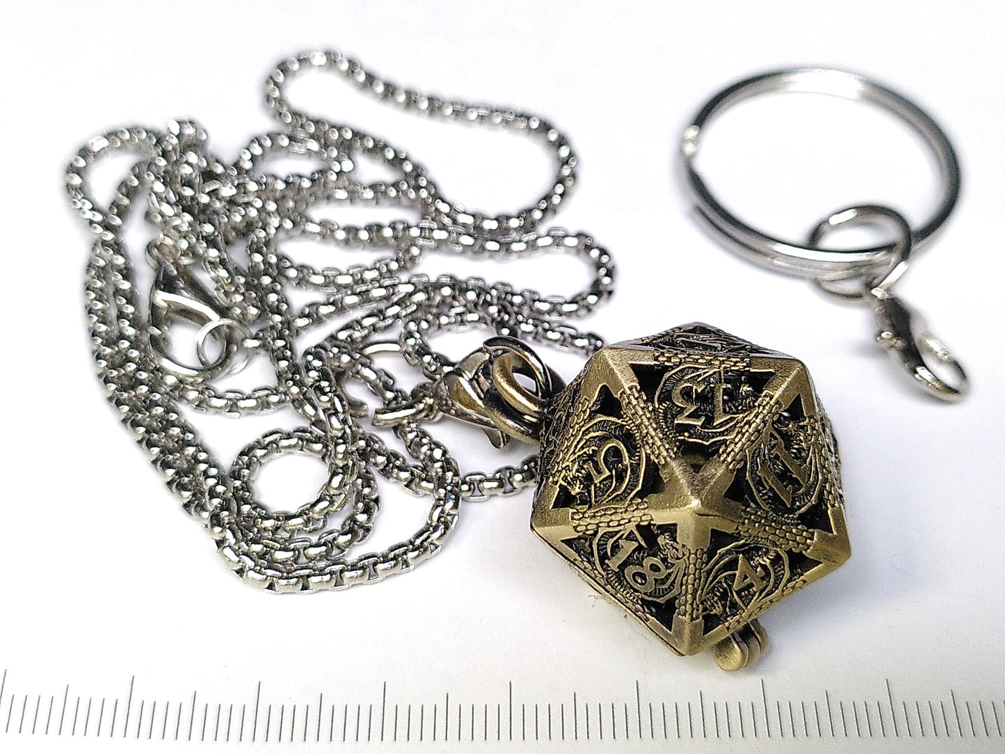 Gold Hollow Dragon dice cage pendant, with mini metal dice