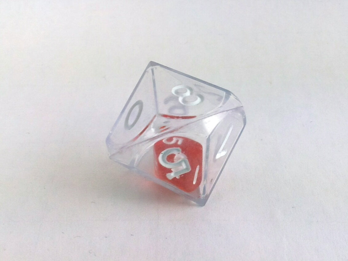 Dubbele d10, kleurloos en rood